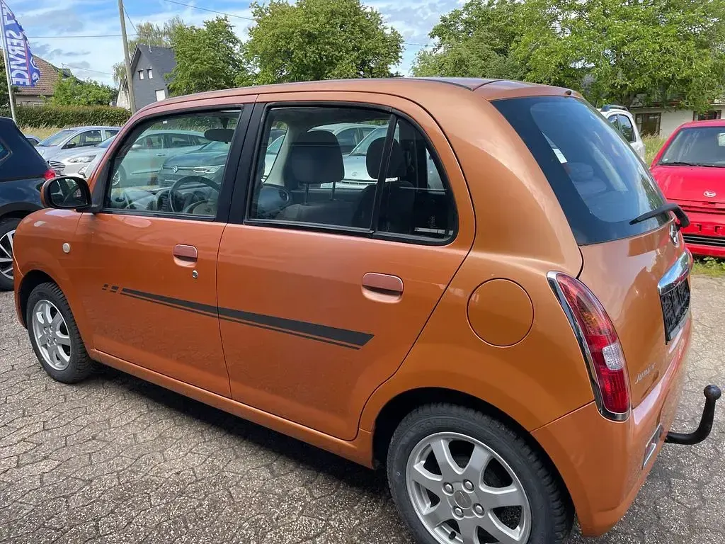 Gebraucht Daihatsu Trevis 58 PS (42 kW) 2007 Orange Kleinwagen