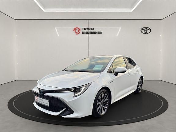 Schneeweiß Gebraucht 2020 Toyota Corolla | 20.888 € (Fairer Preis) - Bild 1/4