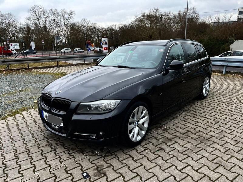 Schwarz Gebraucht 2010 BMW 335 Sport Line Kombi | 14.999 € - Bild 1/4
