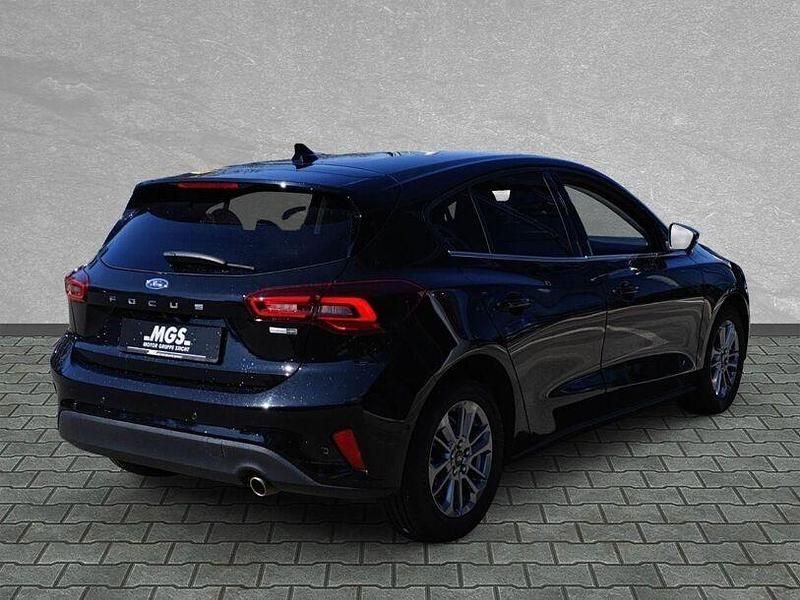 Gebraucht Ford Focus Titanium 125 PS (91 kW) 2023 Agate black metallic Limousine