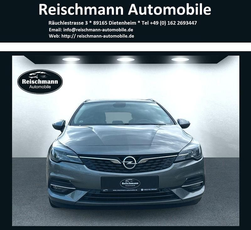 Grau Gebraucht 2021 Opel Astra Edition Kombi | 12.980 € (Fairer Preis) - Bild 1/4