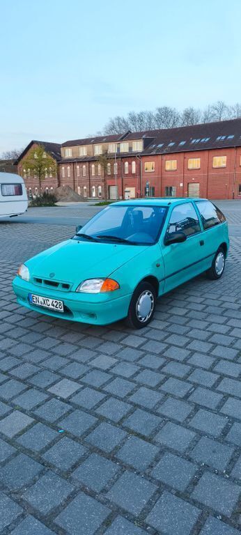 Grün Gebraucht 1999 Suzuki Swift GLS Limousine | 1.600 € - Bild 1/4
