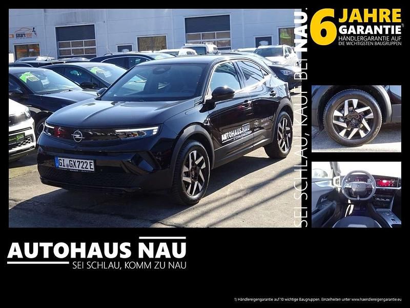 Karbon schwarz Gebraucht 2025 Opel Mokka-e Elegance SUV | 32.990 € - Bild 1/4
