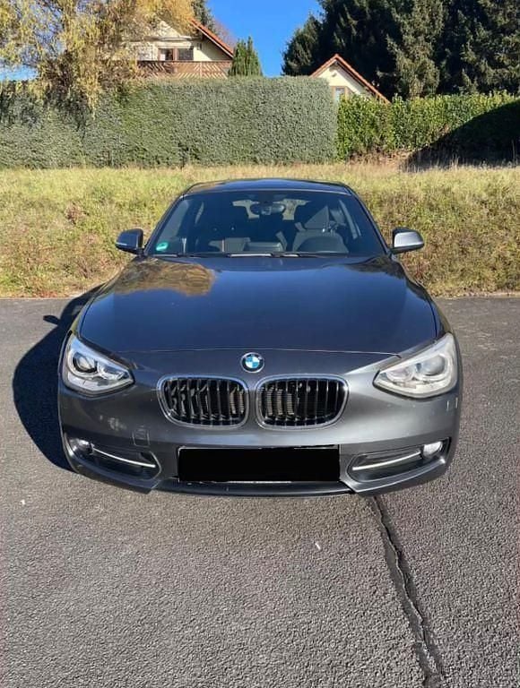 Grau Gebraucht 2013 BMW 116 Sport Line Kleinwagen | 6.900 € (Guter Preis) - Bild 1/4