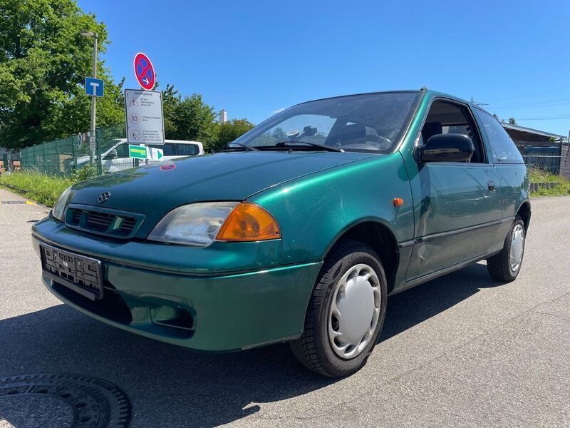 Green metallic Gebraucht 1999 Suzuki Swift GLS Kleinwagen | 499 € - Bild 1/4