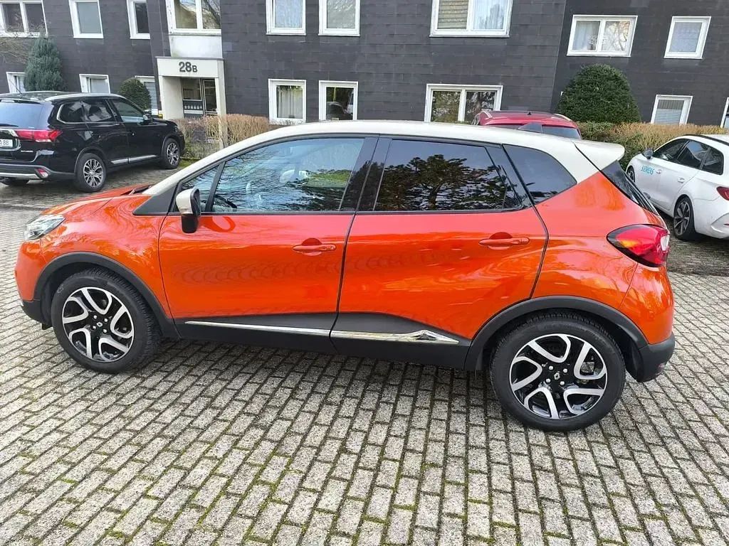 Używany Renault Captur Luxe 120 KM (88 kW) 2015 Pomarańczowy SUV