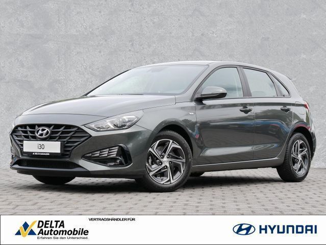 Amazon grey / met Gebraucht 2022 Hyundai i30 Select Limousine | 16.480 € (Fairer Preis) - Bild 1/4