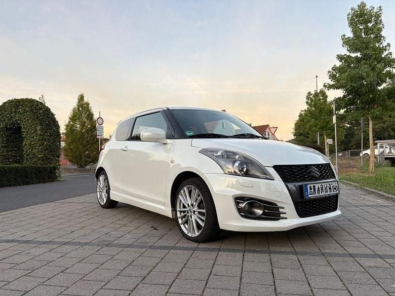 Weiß Gebraucht 2012 Suzuki Swift Sport Kleinwagen | 4.599 € (Fairer Preis) - Bild 1/4
