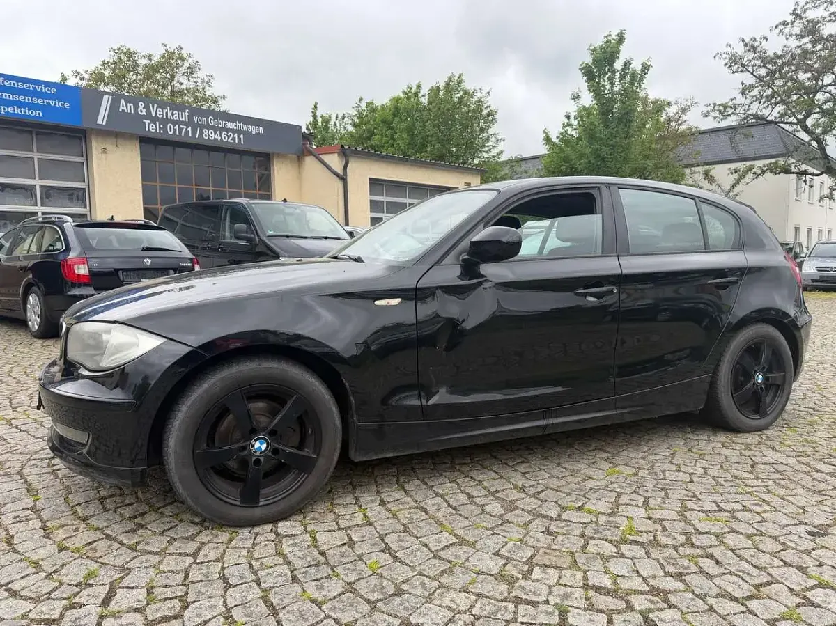 Używany BMW 116 122 KM (89 kW) 2011 Czarny Hatchback