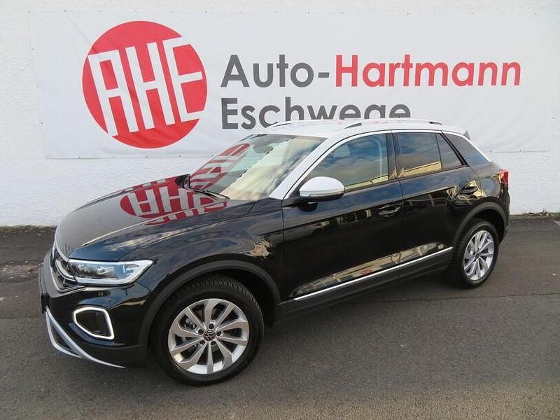 Deep black perleffekt Gebraucht 2024 VW T-Roc Business SUV | 27.280 € (Guter Preis) - Bild 1/4