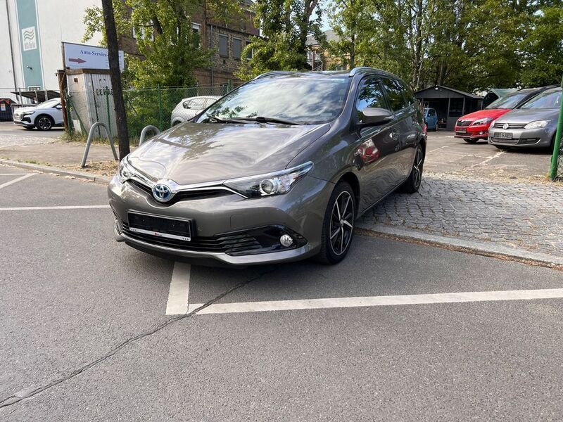 Grau Gebraucht 2017 Toyota Auris Hybrid Edition-S Kombi | 13.599 € (Guter Preis) - Bild 1/4