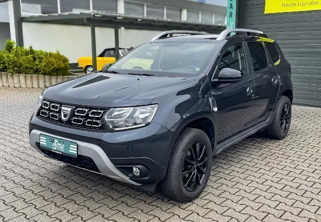 Grau Gebraucht 2021 Dacia Duster Celebration SUV | 13.390 € (Guter Preis) - Bild 1/4
