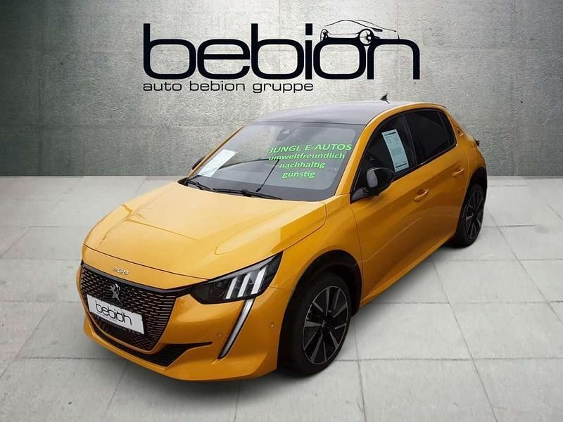 Gelb Gebraucht 2021 Peugeot e-208 GT Kleinwagen | 18.880 € (Etwas zu teuer) - Bild 1/4
