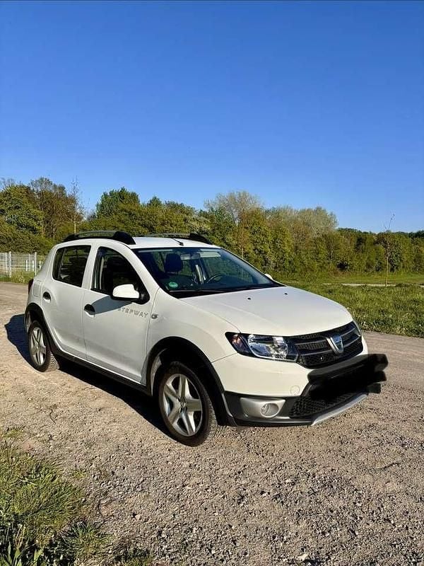 Używany Dacia Sandero Prestige 90 KM (66 kW) 2014 Biały Hatchback
