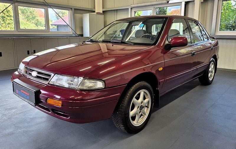 Violet Gebraucht 1995 Kia Sephia 2 Limousine | 3.390 € - Bild 1/4