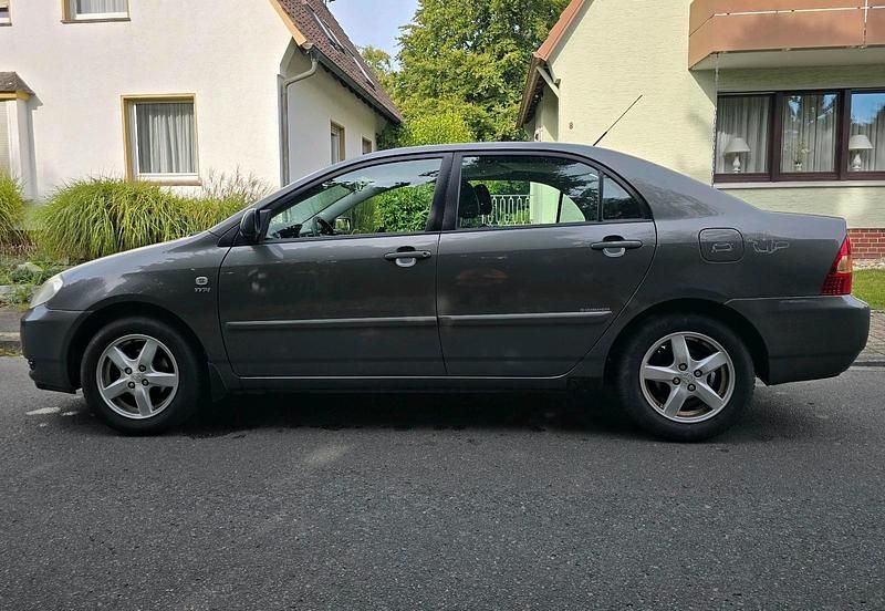 Grau Gebraucht 2003 Toyota Corolla Limousine | 2.500 € (Fairer Preis) - Bild 1/4