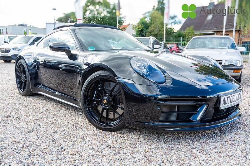 2t2t tiefschwarzmetallic (metallic) Gebraucht 2023 Porsche 911 Carrera 4 GTS Coupé | 168.000 € - Bild 1/4