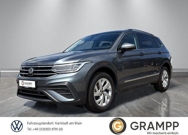 Platinum grey metallic Gebraucht 2024 VW Tiguan Allspace Life SUV | 34.940 € (Superpreis) - Bild 1/4