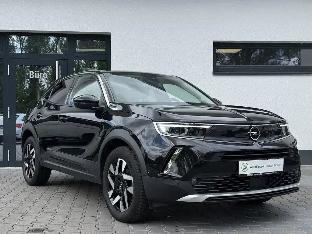 Gebraucht Opel Mokka Elegance 131 PS (96 kW) 2023 Diamant schwarz/karbon schwarz SUV