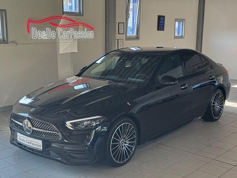 Obsidianschwarz Gebraucht 2022 Mercedes C300 AMG line Limousine | 42.700 € (Teuer) - Bild 1/4
