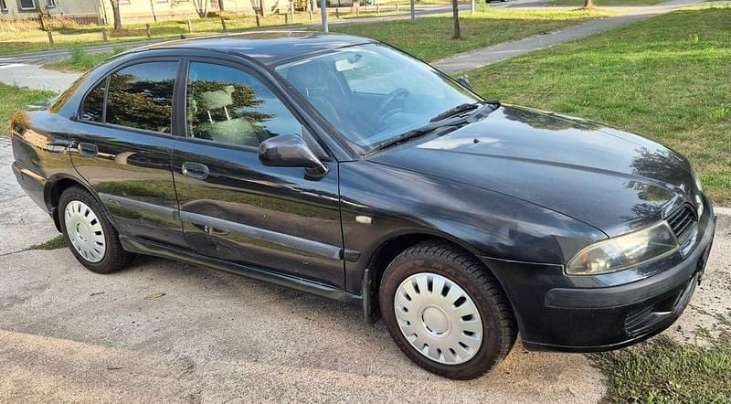 Gebraucht Mitsubishi Carisma 103 PS (75 kW) 2003 Schwarz Limousine