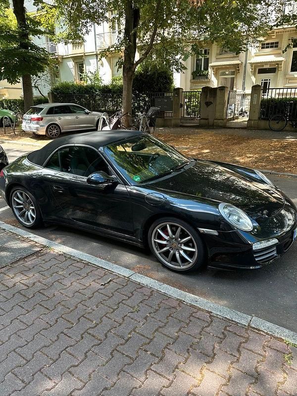 Schwarz Gebraucht 2009 Porsche 911 Carrera 4S Cabriolet Cabrio | 86.997 € (Teuer) - Bild 1/4