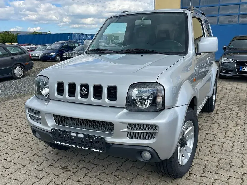 Używany Suzuki Jimny Style 86 KM (63 kW) 2012 Srebrny SUV