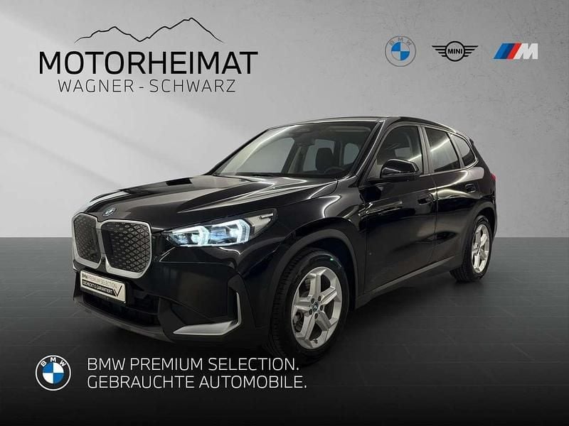 Schwarz uni Gebraucht 2024 BMW iX1 SUV | 41.489 € (Guter Preis) - Bild 1/3