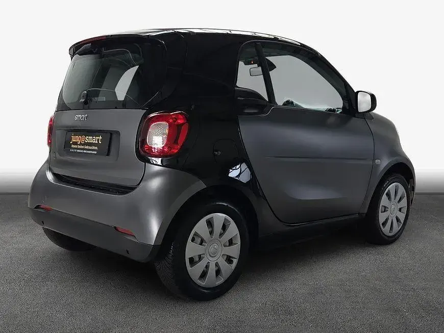 Gebraucht Smart ForTwo Coupé 60 kW (82 PS) 2023 Titannia grey matt Coupé