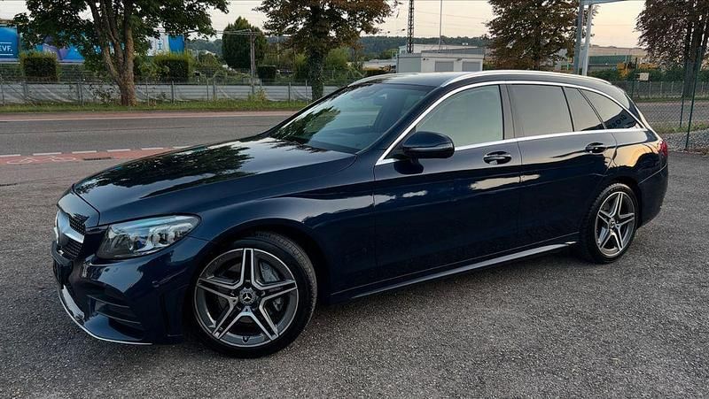 Blau Gebraucht 2020 Mercedes C200 AMG line Limousine | 24.850 € (Etwas zu teuer) - Bild 1/4