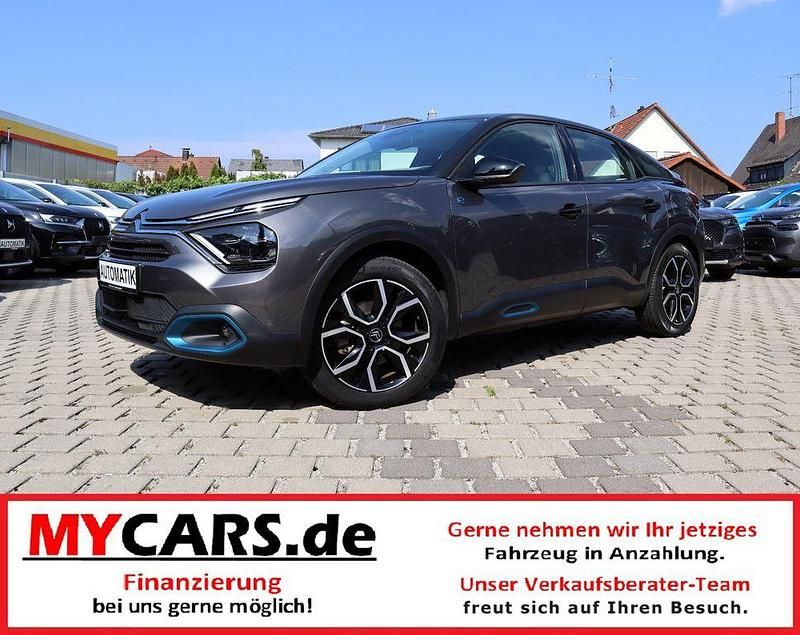 Lackierung platiniumgrau/typ Gebraucht 2022 Citroën e-C4 Chic Limousine | 15.252 € - Bild 1/3
