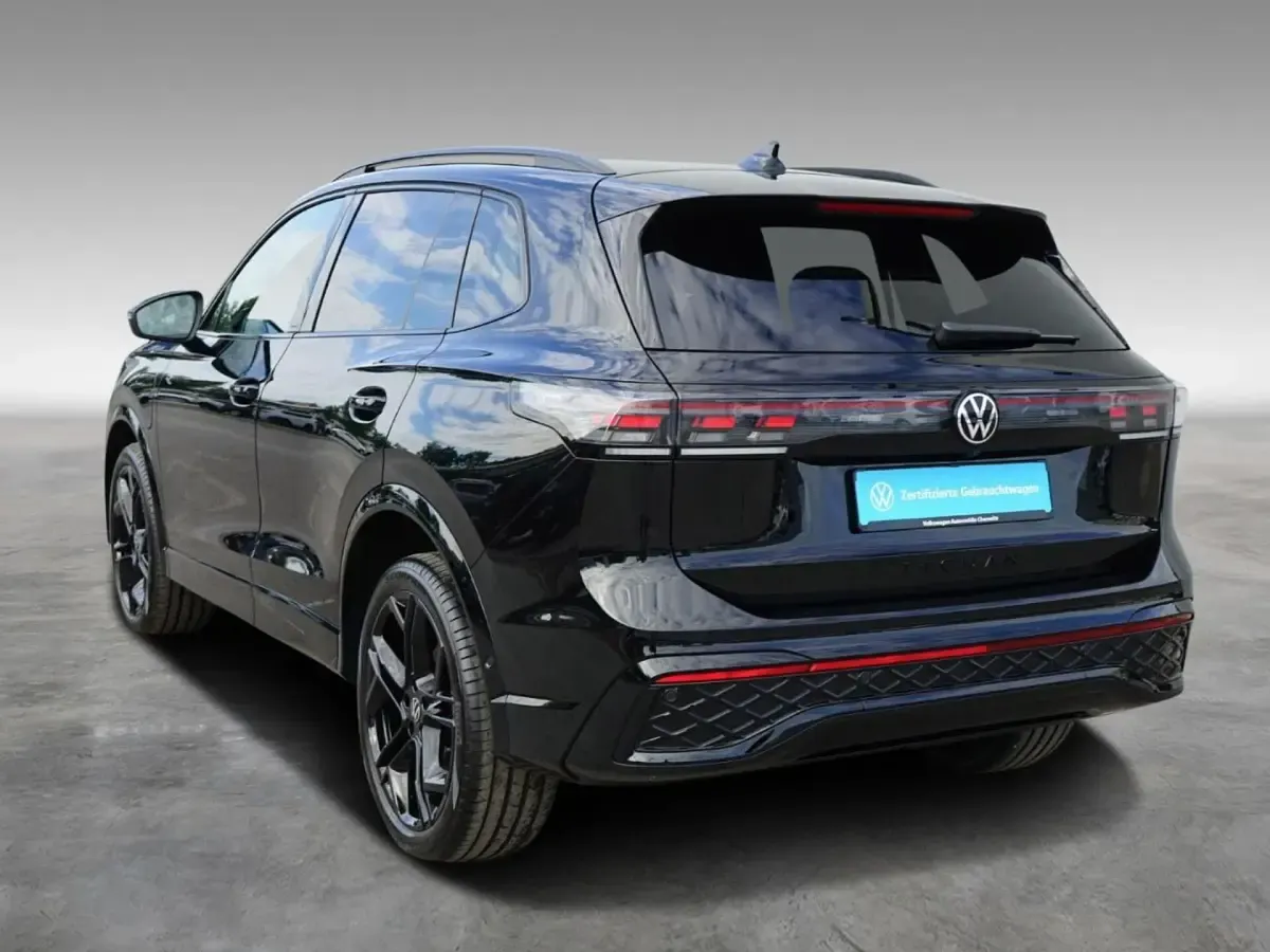 Gebraucht VW Tiguan R-line 272 PS (200 kW) 2025 0e grenadillschwarz metallic SUV