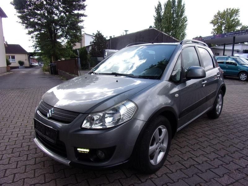 Grau Gebraucht 2007 Suzuki SX4 Kleinwagen | 4.950 € (Teuer) - Bild 1/4