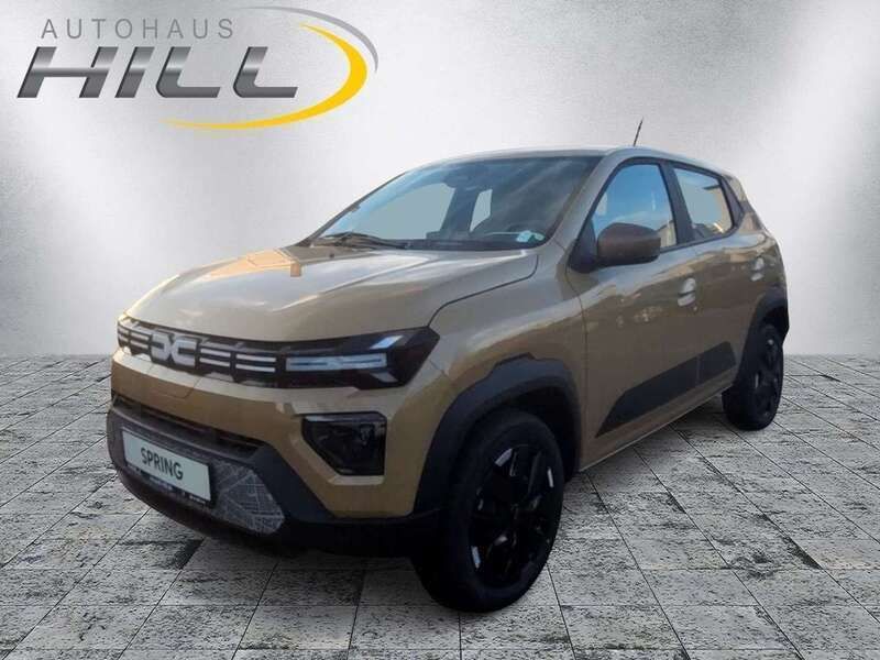Safaribeige Neu 2024 Dacia Spring Extreme Kleinwagen | 22.669 € (Teuer) - Bild 1/4