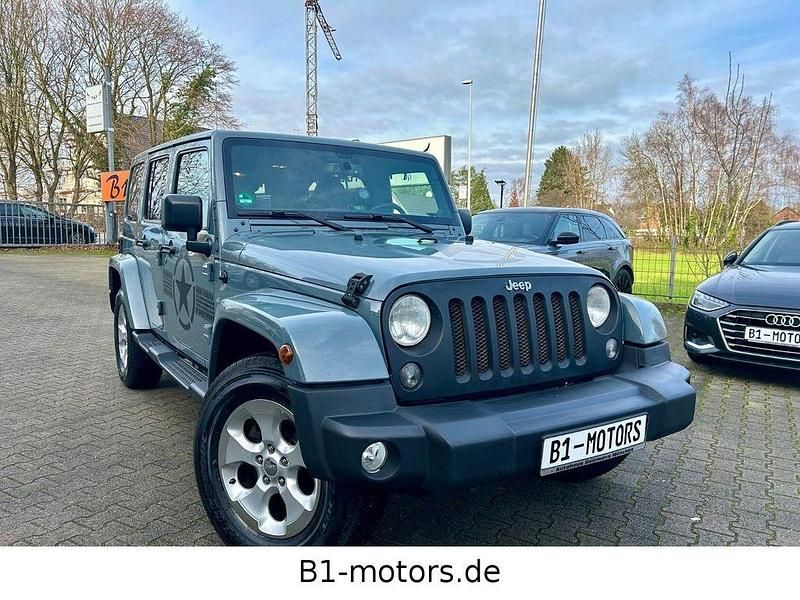 Grau Gebraucht 2014 Jeep Wrangler Unlimited Sahara SUV | 24.900 € (Fairer Preis) - Bild 1/4