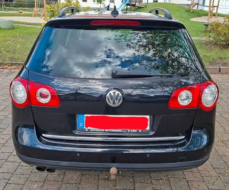Second-hand VW Passat Sportline 160 CP (117 kW) 2009 Negru Break