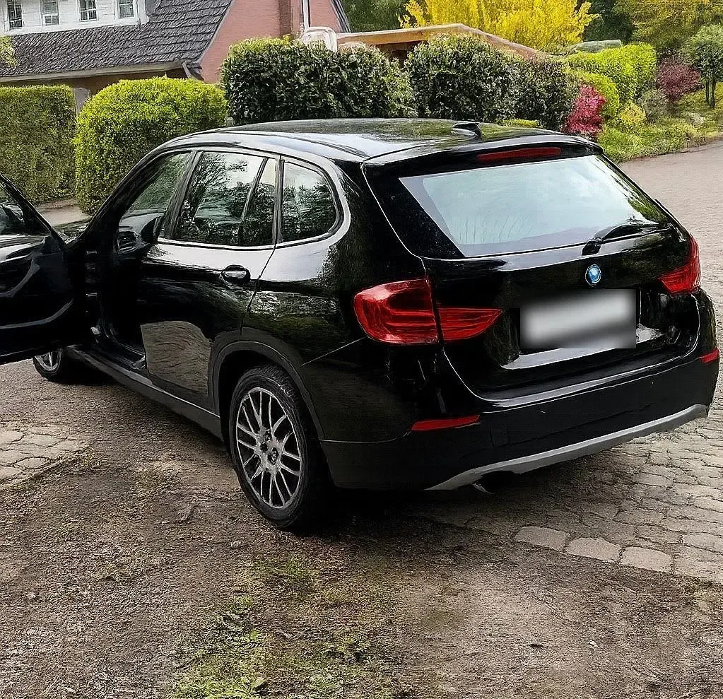 Second-hand BMW X1 218 CP (160 kW) 2011 Negru SUV