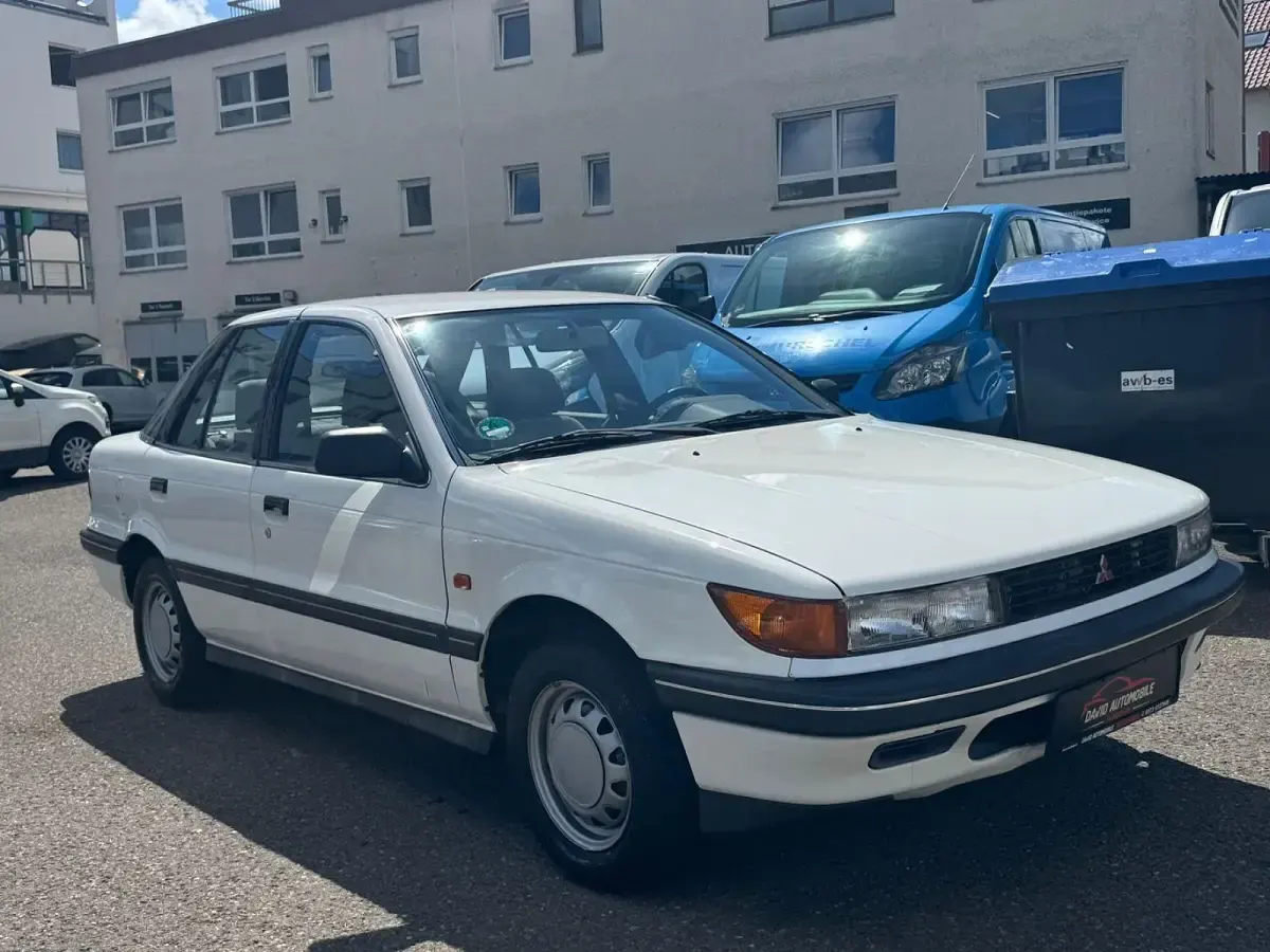 Gebraucht Mitsubishi Lancer 90 PS (66 kW) 1992 Weiß Limousine