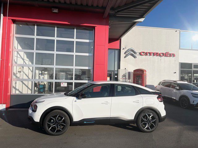 Polarweiß Gebraucht 2023 Citroën e-C4 Feel Limousine | 32.000 € - Bild 1/4