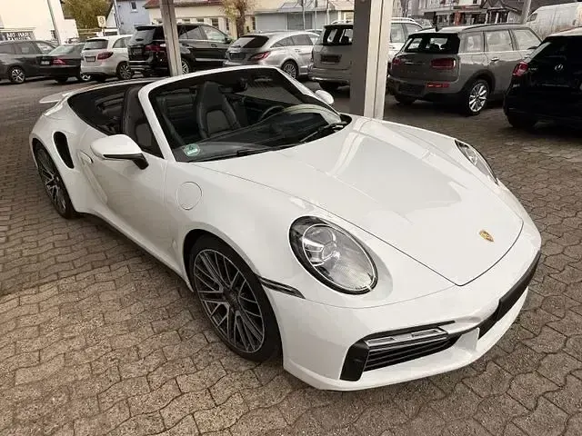 Gebraucht Porsche 992 581 PS (427 kW) 2021 Carraweißmetallic Cabrio