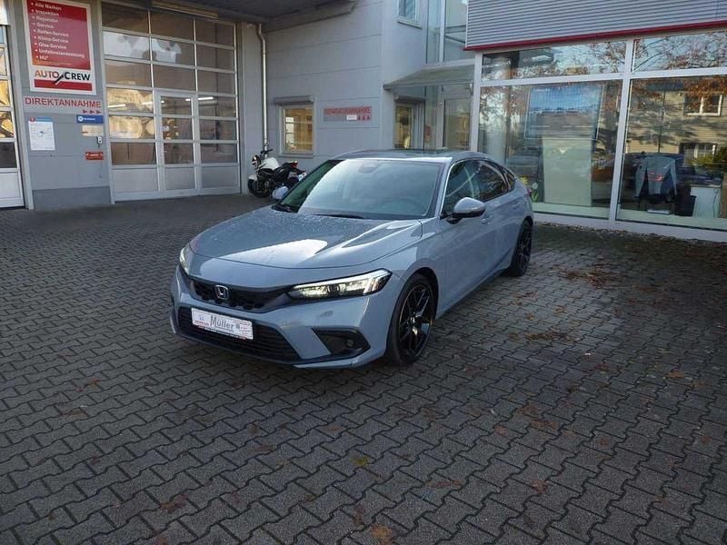 Sonic gray p. Gebraucht 2023 Honda Civic Advance Limousine | 29.999 € (Teuer) - Bild 1/4