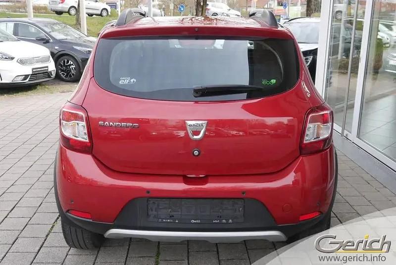 Gebraucht Dacia Sandero Prestige 90 PS (66 kW) 2015 Flammenrot metallic Kleinwagen