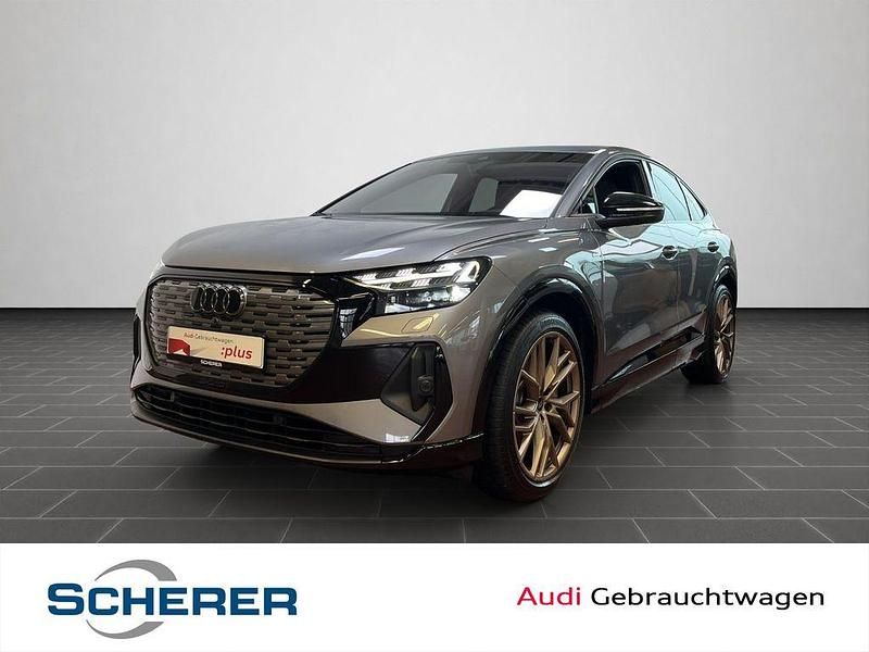 Taifungrau metallic (metallic) Gebraucht 2022 Audi Q4 Sportback e-tron Ambiente SUV | 38.960 € (Fairer Preis) - Bild 1/4