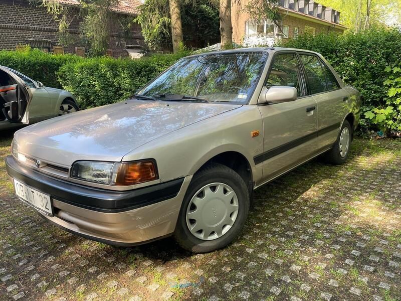 Gold Gebraucht 1991 Mazda 323 Limousine | 3.200 € - Bild 1/4