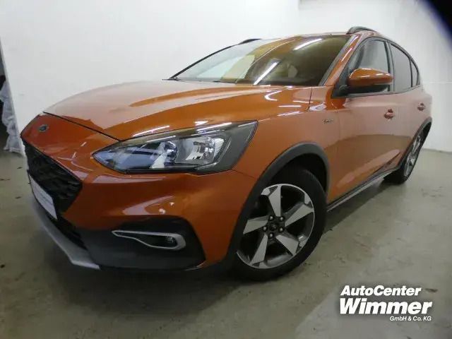 Hokaidoorange (orange) Gebraucht 2019 Ford Focus Active Limousine | 13.990 € (Fairer Preis) - Bild 1/4