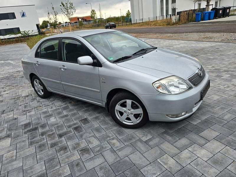 Silber Gebraucht 2004 Toyota Corolla Sol Limousine | 5.700 € (Fairer Preis) - Bild 1/4