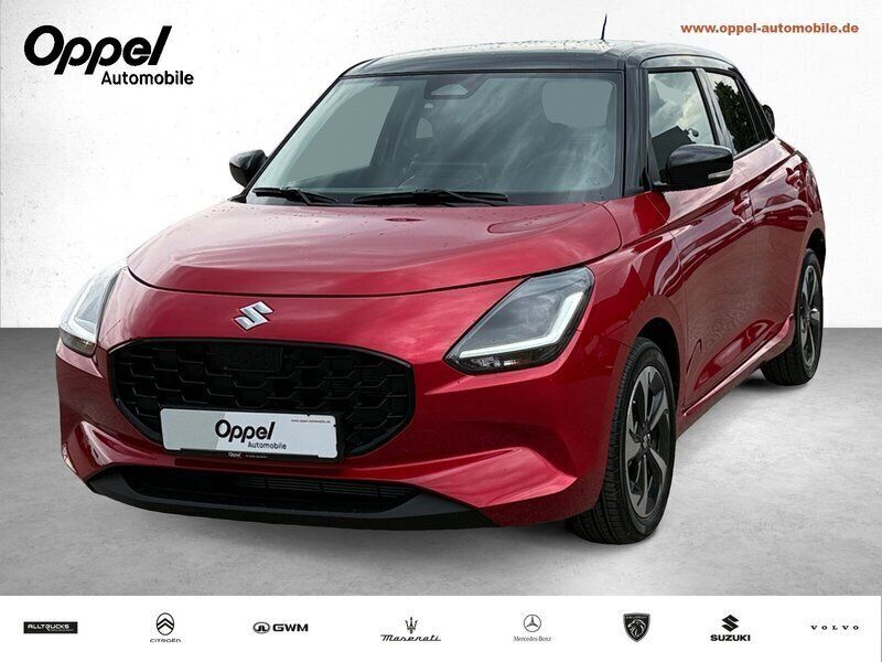 Burning/super black pearl met. Neu 2025 Suzuki Swift Comfort Kleinwagen | 24.777 € - Bild 1/3