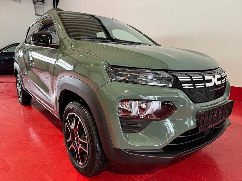 Gebraucht Dacia Spring Essentiel 33 kW (45 PS) 2023 Olivgrün Kleinwagen