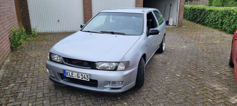 Silber Gebraucht 1996 Nissan Almera Kleinwagen | 1.799 € - Bild 1/4
