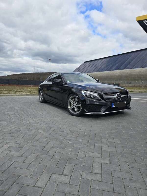 Schwarz Gebraucht 2017 Mercedes C250 AMG line Coupé | 24.500 € (Fairer Preis) - Bild 1/4